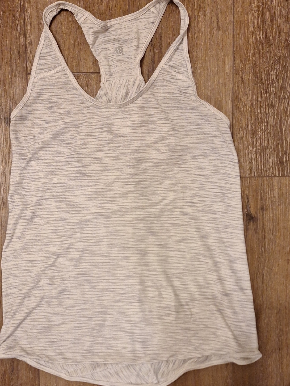 Lululemon racerback looks like 8/10 no tag pinhole as shown